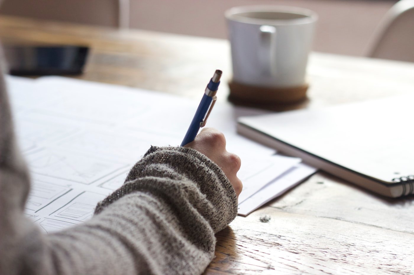 Writer working on a manuscript